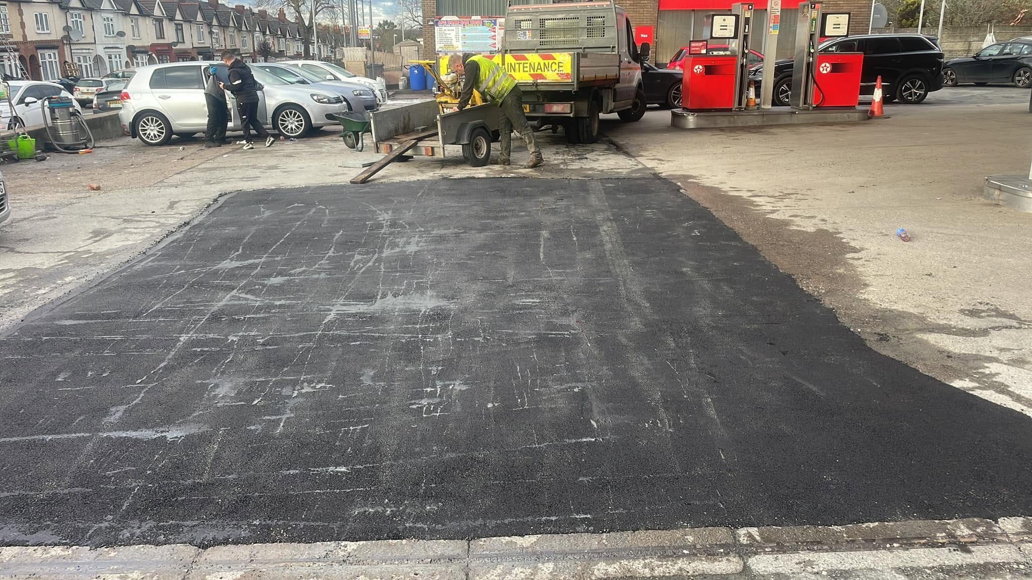 Forecourt tarmac repair at a petrol station